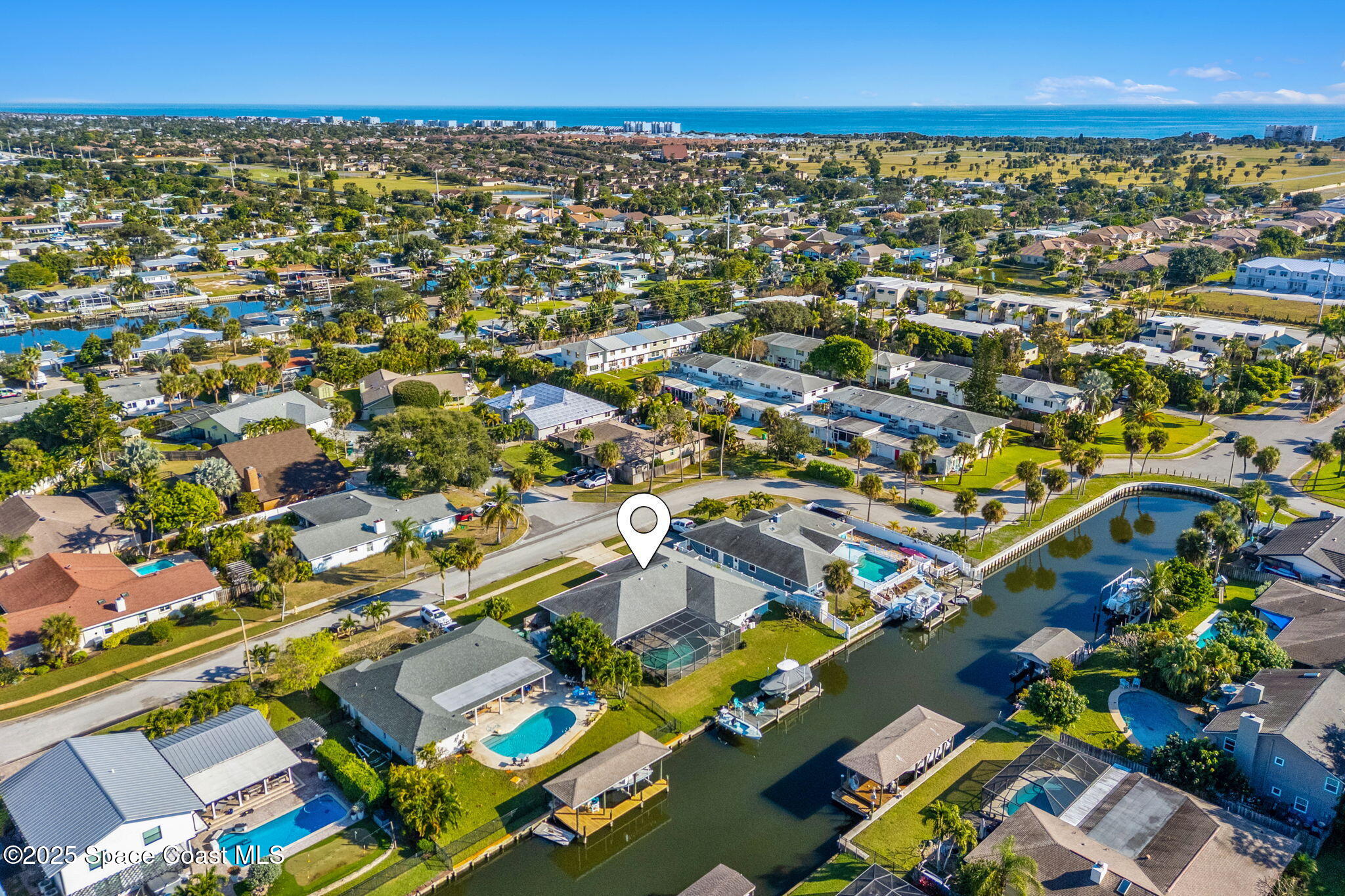 615 Mark And Randy Drive Satellite Beach, FL 32937 - Photo 38 of 40 an aerial view of residential houses with outdoor space and parking