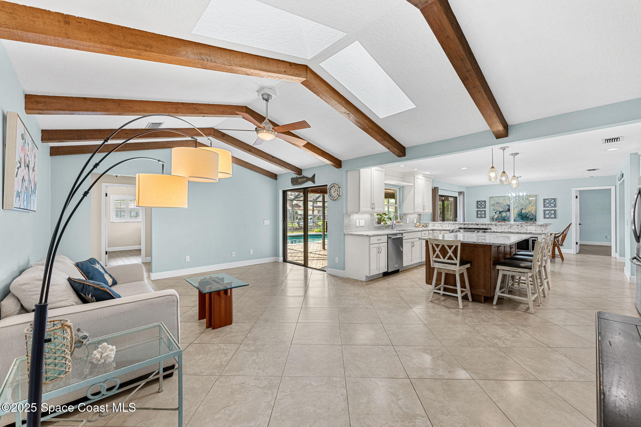 615 Mark And Randy Drive Satellite Beach, FL 32937 - Photo 8 of 40 a view of a livingroom with furniture and toys