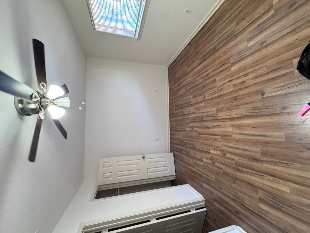 8207 Sam Rayburn Drive, Unit 204 Austin, TX 78753 - Photo 1 of 8 wooden floor in an empty room with a window