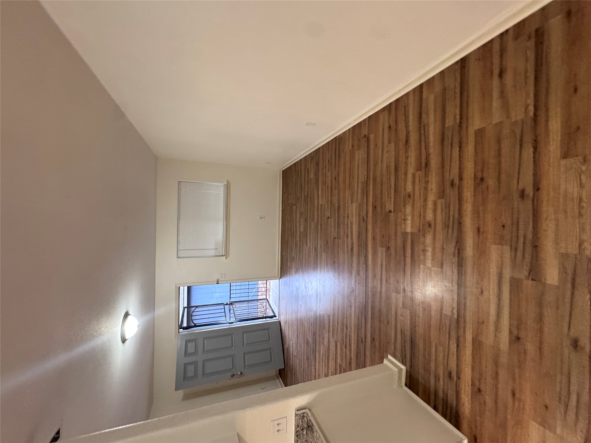 8207 Sam Rayburn Drive, Unit 204 Austin, TX 78753 - Photo 11 of 27 a view of a hallway with wooden floor