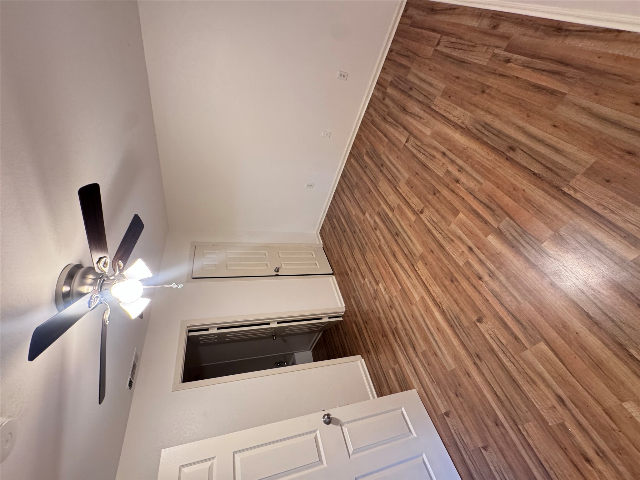 8207 Sam Rayburn Drive, Unit 204 Austin, TX 78753 - Photo 17 of 27 a view of a livingroom with wooden floor