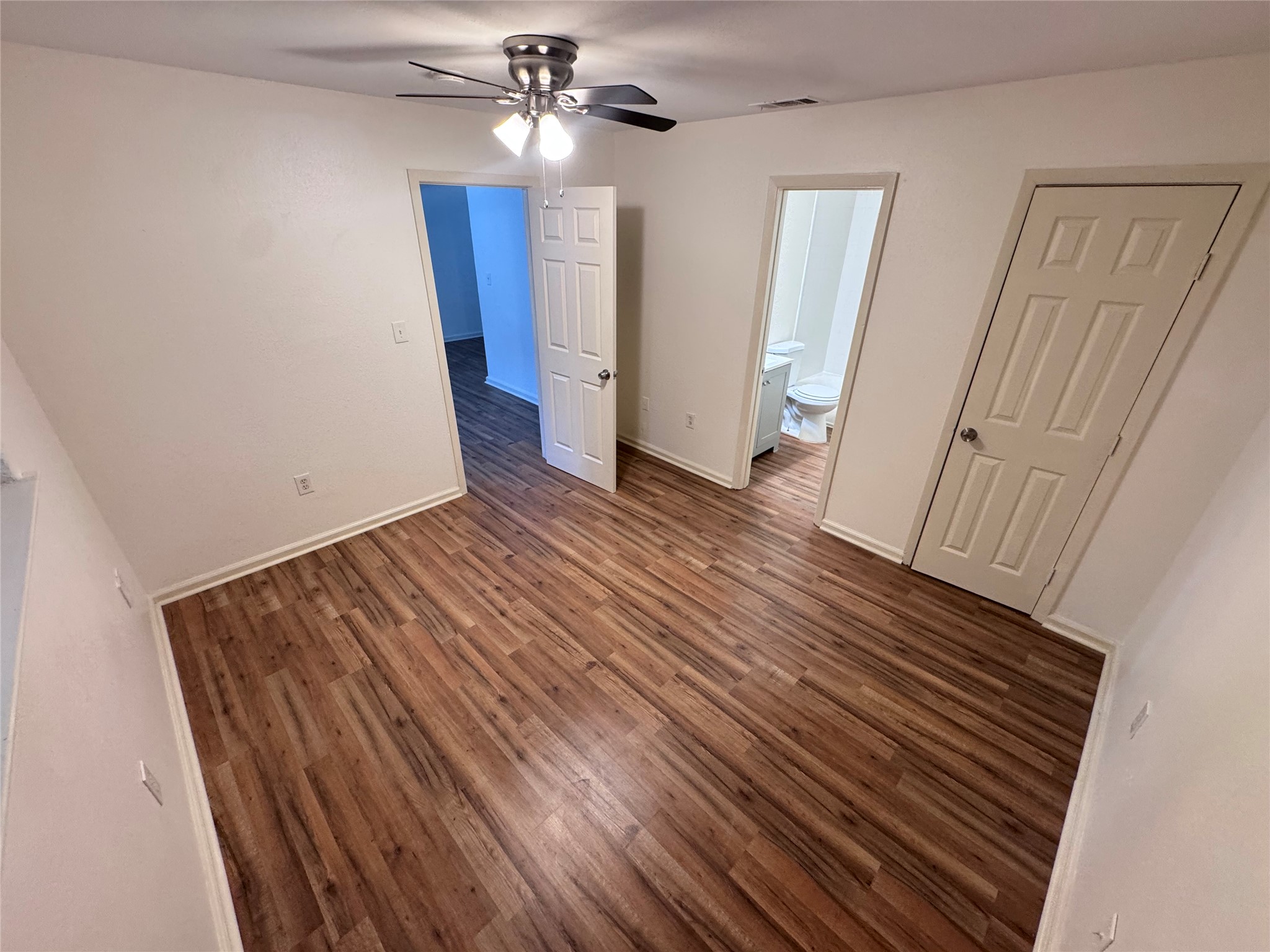 8207 Sam Rayburn Drive, Unit 204 Austin, TX 78753 - Photo 20 of 27 wooden floor in an empty room