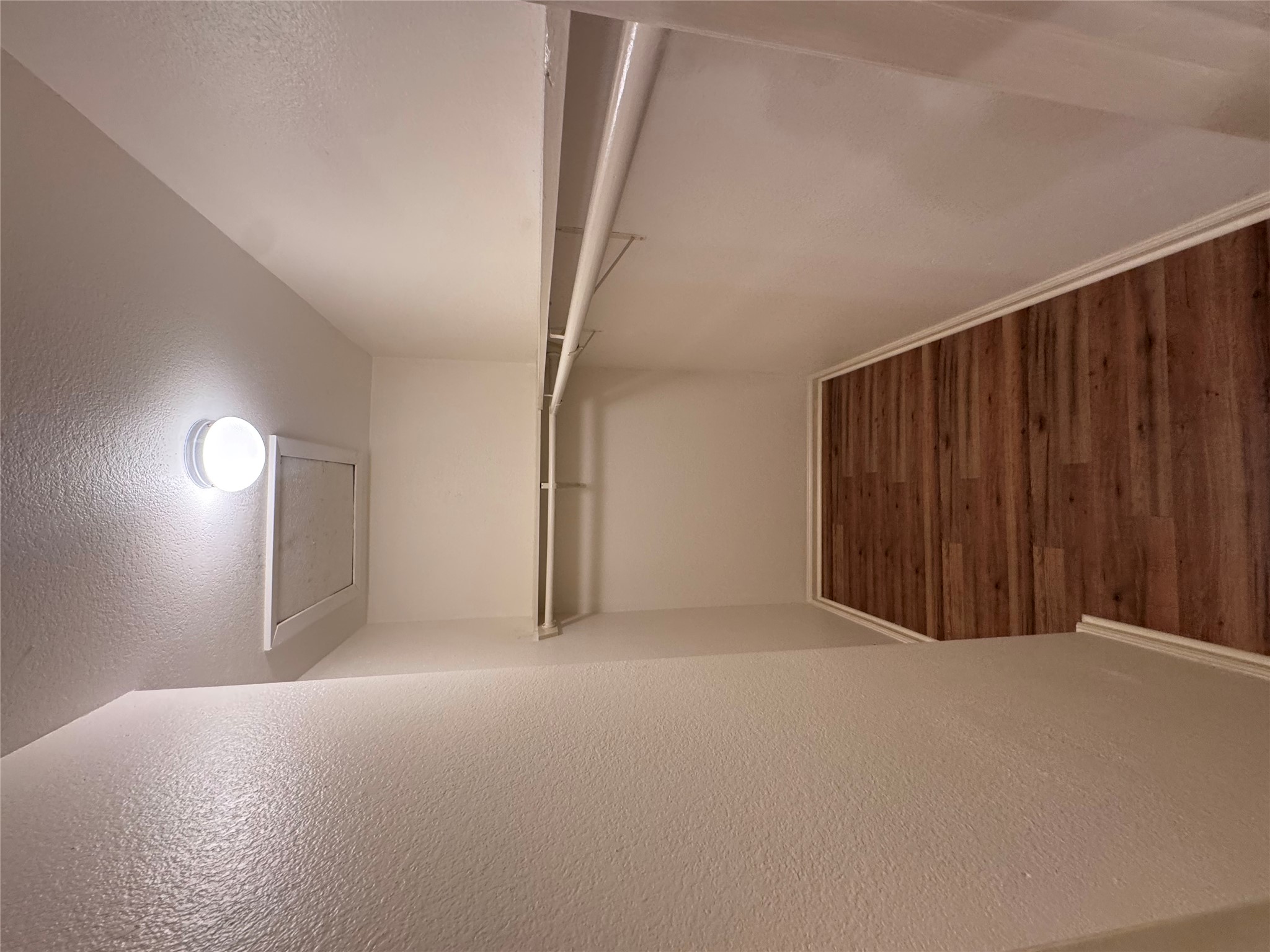 8207 Sam Rayburn Drive, Unit 204 Austin, TX 78753 - Photo 22 of 27 a view of a room with wooden floor