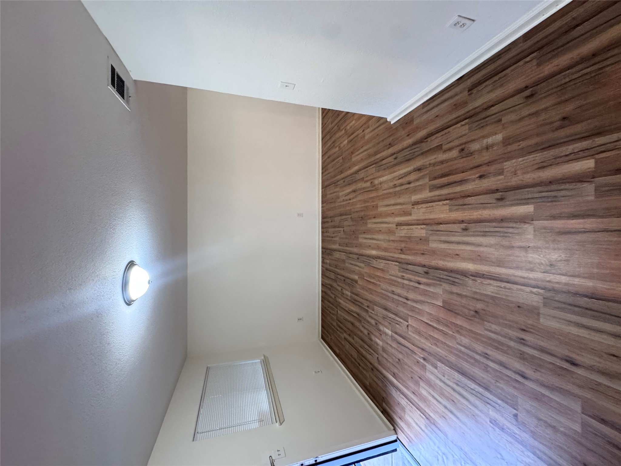 8207 Sam Rayburn Drive, Unit 204 Austin, TX 78753 - Photo 3 of 27 a view of wooden floor in a room