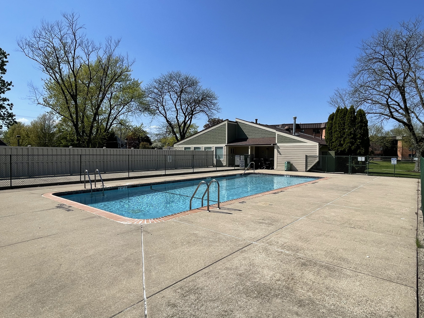 6443 Clarendon Hills Road, Unit 107 Willowbrook, IL 60527 - Photo 16 of 19 a view of swimming pool with outdoor seating
