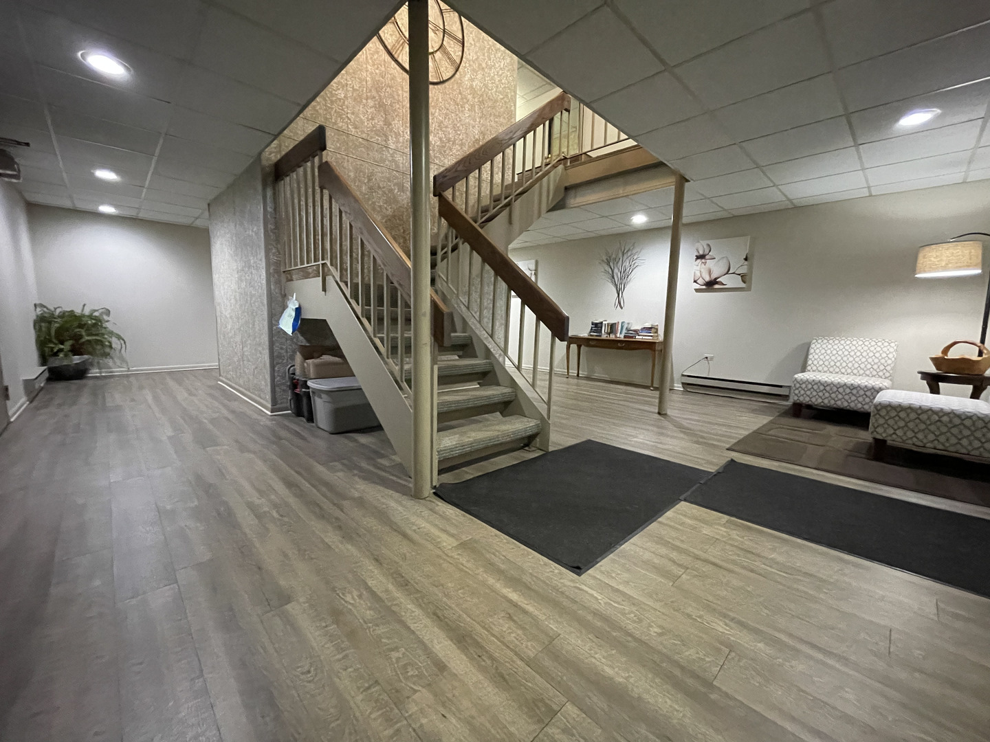 6443 Clarendon Hills Road, Unit 107 Willowbrook, IL 60527 - Photo 2 of 19 a view of entryway and hall with wooden floor