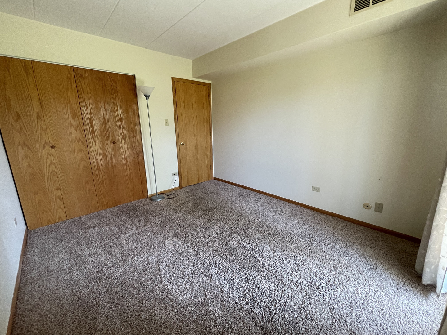 6443 Clarendon Hills Road, Unit 107 Willowbrook, IL 60527 - Photo 10 of 19 a view of empty room