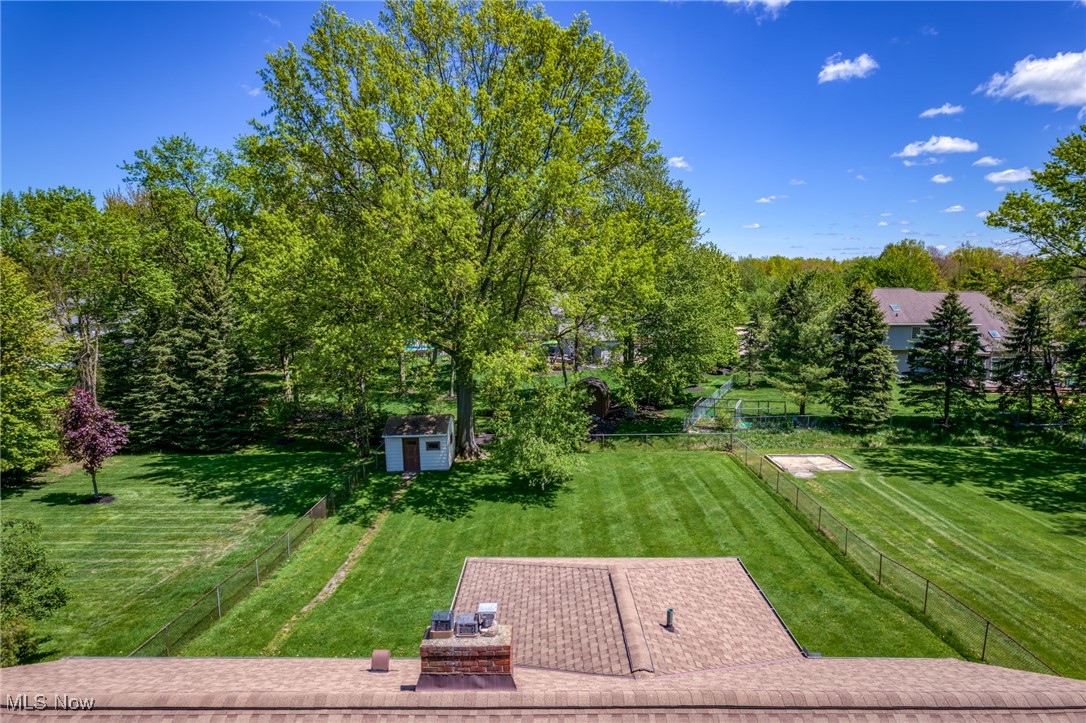 531 Ransome Road Cleveland, OH 44143 - Photo 2 of 27 Concrete patio overlooks the huge fenced-in backyard with shed.