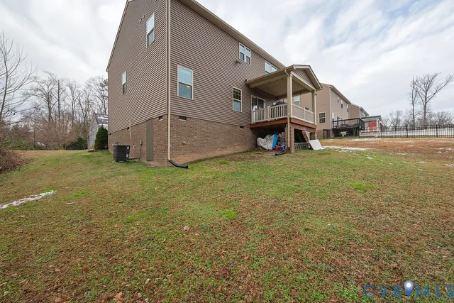 a swimming pool with some trees in the background