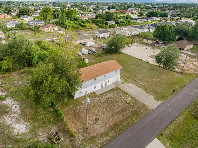 a view of a lake with a yard