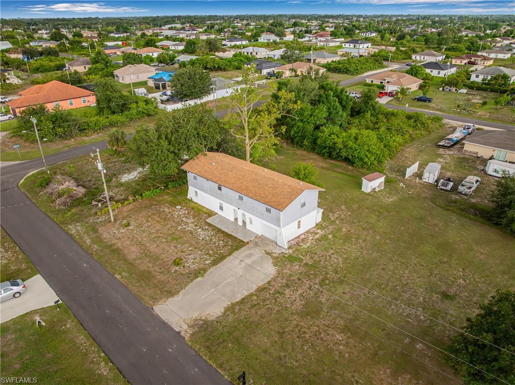 3303 6th Street Southwest Lehigh Acres, FL 33976 - Photo 2 of 23 a view of a city
