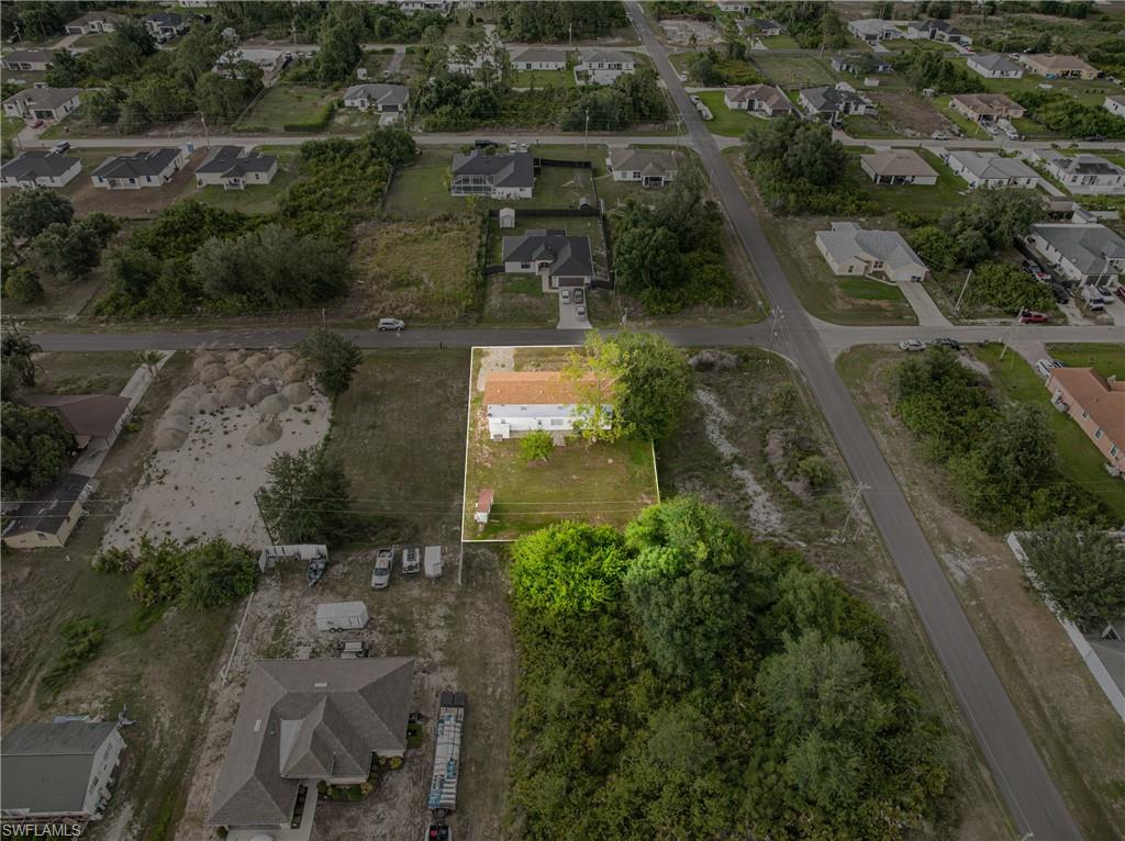 3303 6th Street Southwest Lehigh Acres, FL 33976 - Photo 23 of 23 an aerial view of residential house with outdoor space