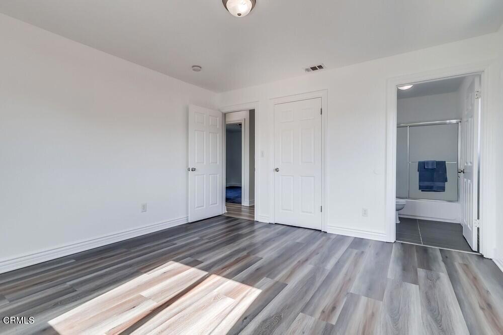 140 East 101st Street Los Angeles, CA 90003 - Photo 16 of 22 a view of an empty room and glass door