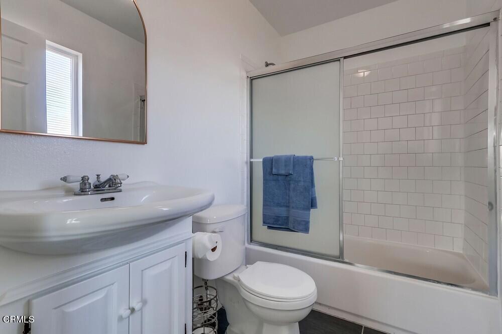 140 East 101st Street Los Angeles, CA 90003 - Photo 18 of 22 a bathroom with a sink toilet and shower