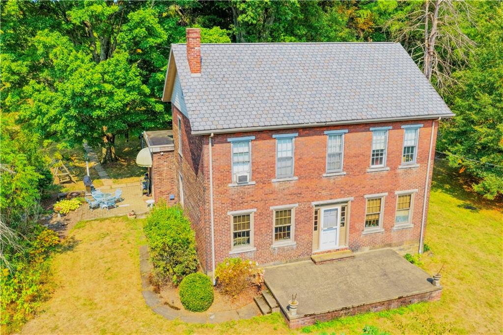 828 Brownhome Road New Castle, PA 16101 - Photo 5 of 47 Classic 1850 2 story Brick Colonial. 4 bedrooms 2 baths, 4 car garage, inground swimmingpool 9.72 Acres