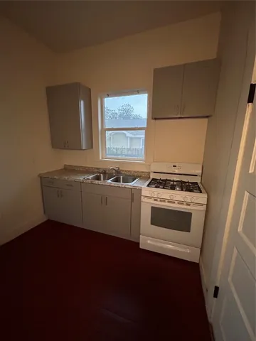 a view of utility room and stove