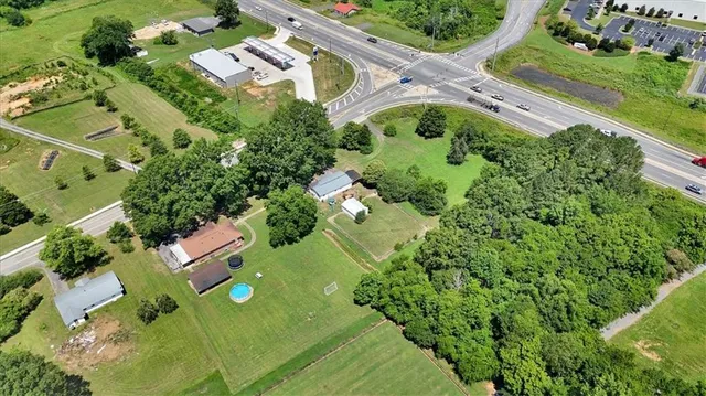 an aerial view of residential house and outdoor space