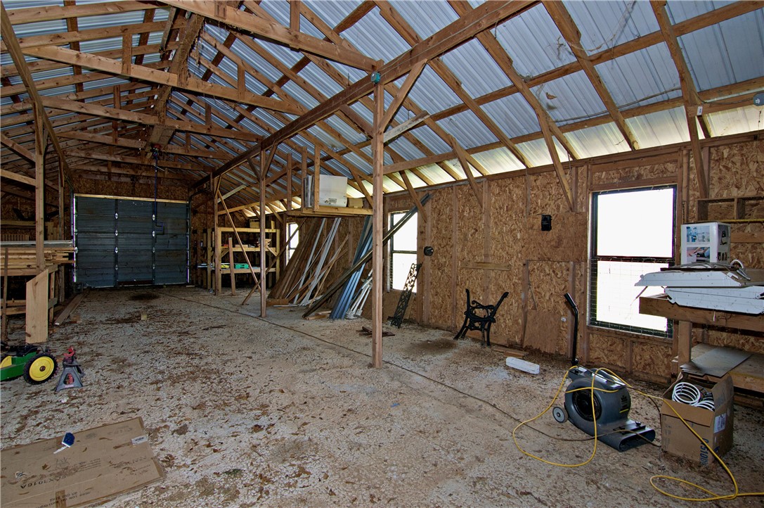 7893 Athens Road Carnesville, GA 30521 - Photo 39 of 50 This spacious barn offers ample room and natural light for various uses.