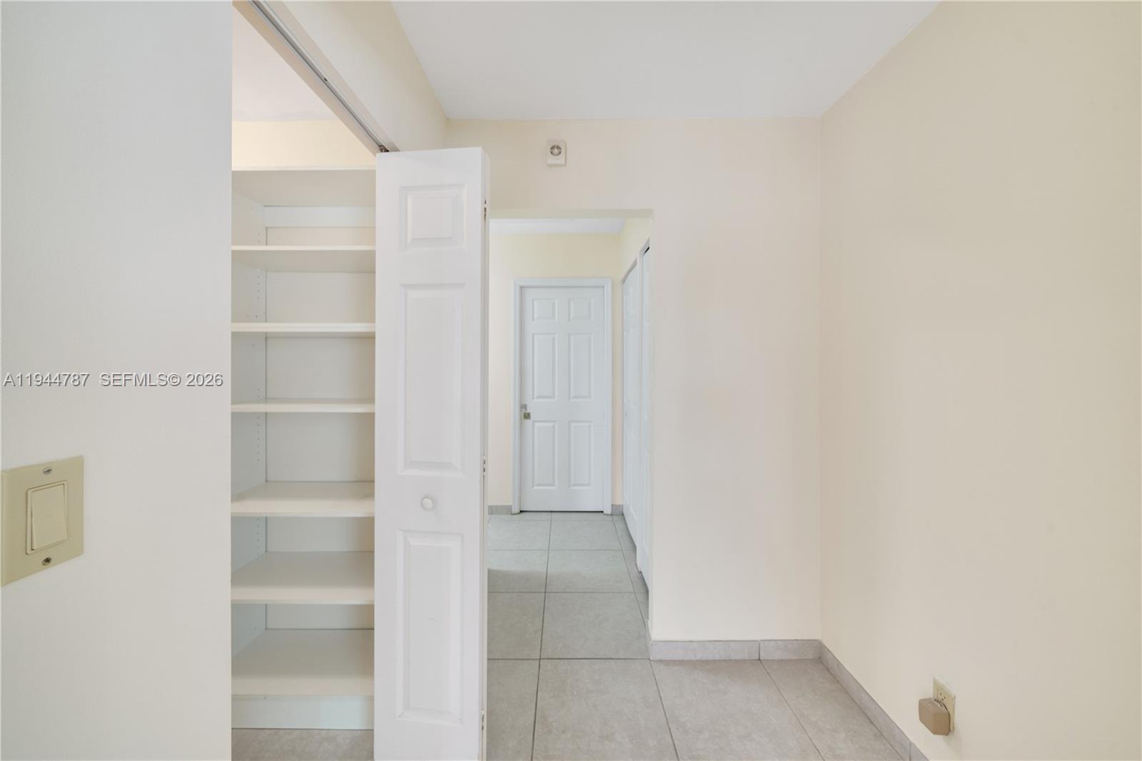 5524 Cleveland Street Hollywood, FL 33021 - Photo 16 of 36 a view of an empty walk in closet