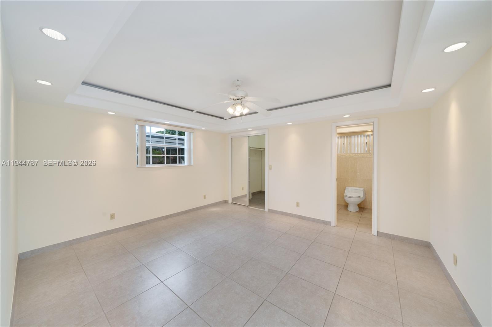 5524 Cleveland Street Hollywood, FL 33021 - Photo 27 of 36 a view of an empty room with a window