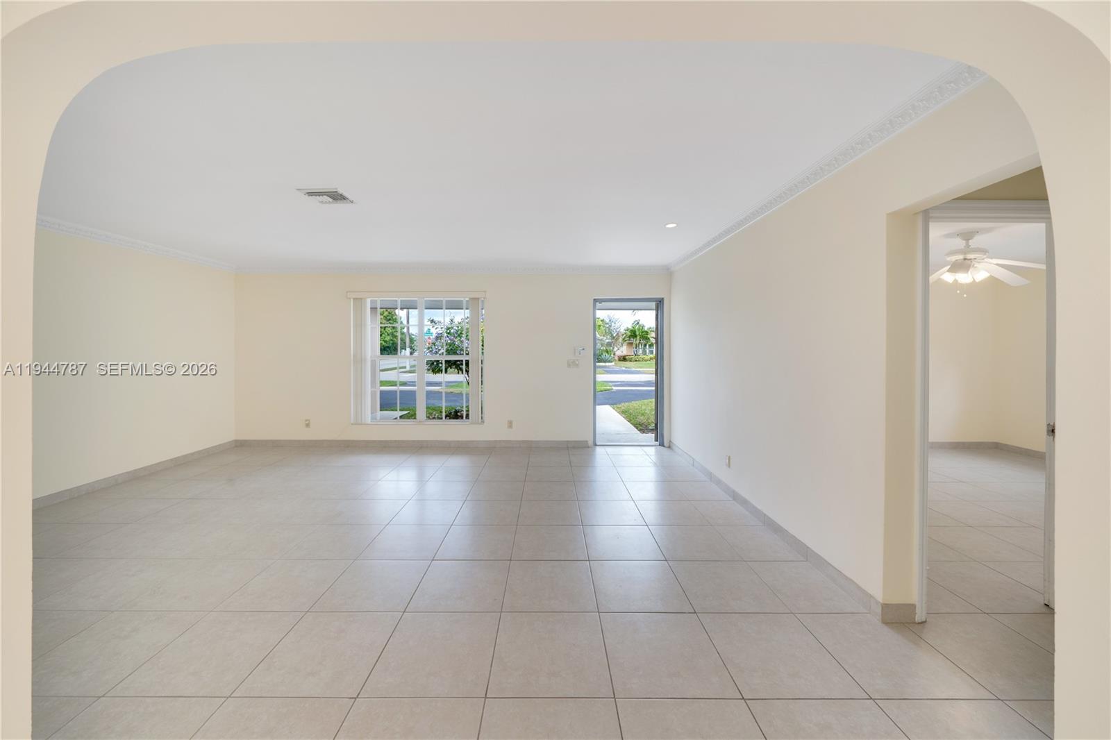 5524 Cleveland Street Hollywood, FL 33021 - Photo 8 of 36 a view of an empty room with a window