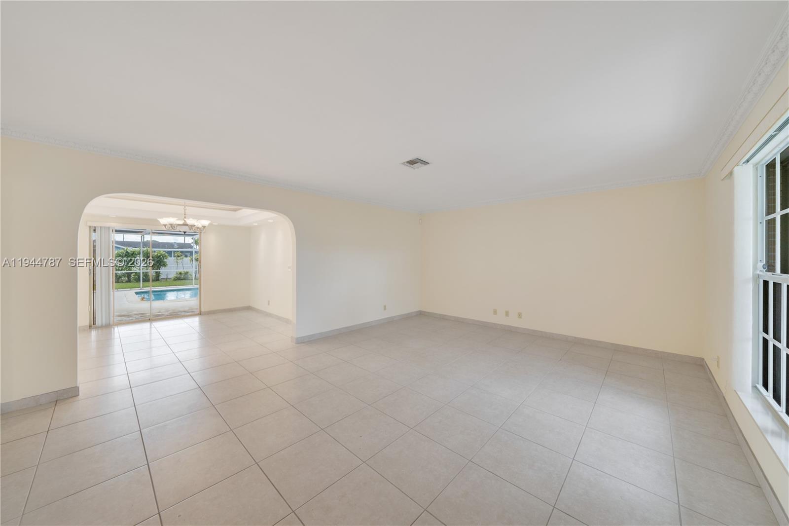 5524 Cleveland Street Hollywood, FL 33021 - Photo 10 of 36 an empty room with windows