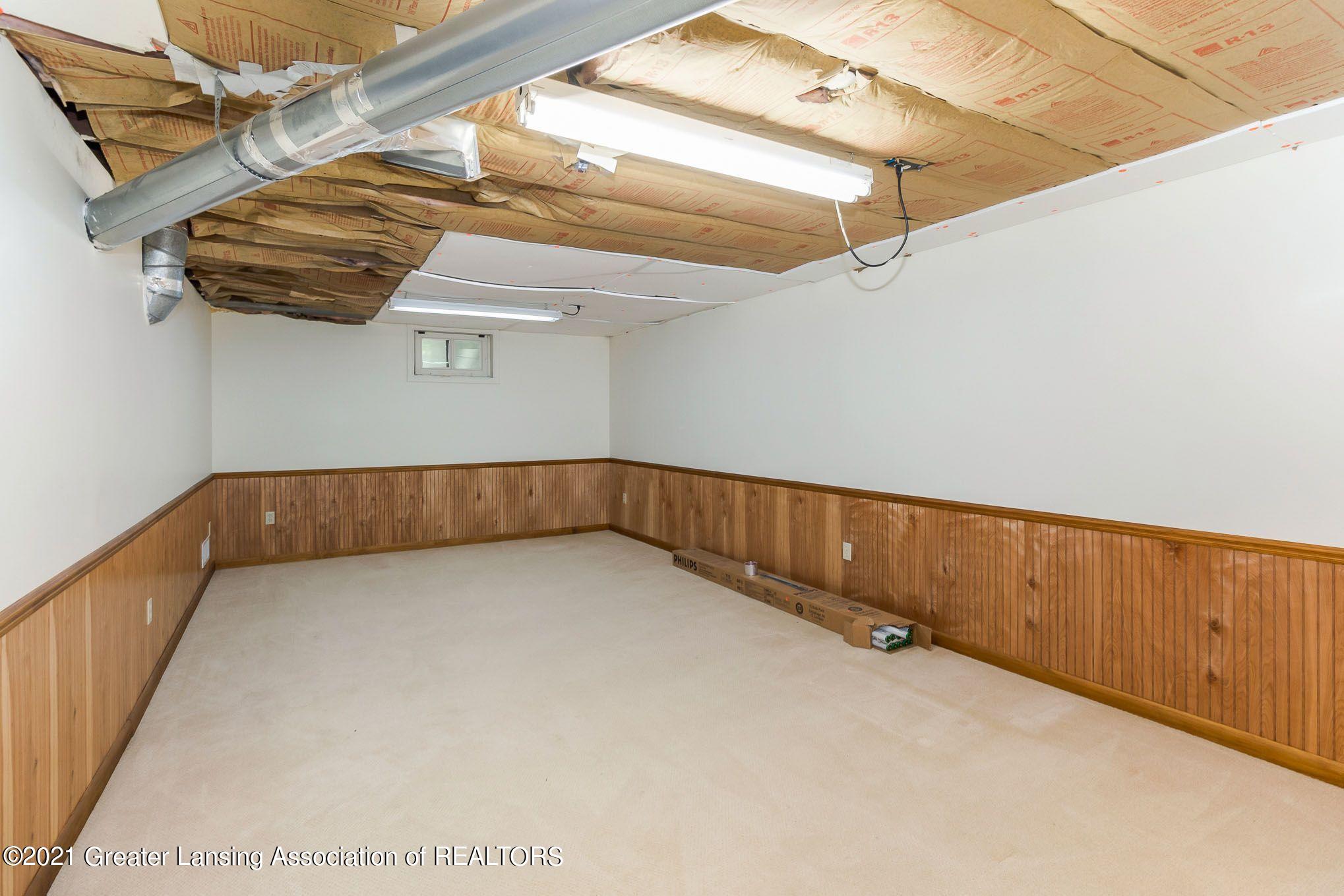 1404 Haslett Road Haslett, MI 48840 - Photo 21 of 26 Lower level rec room
