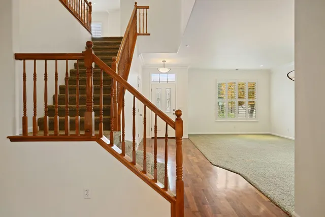 a big room with closet and windows