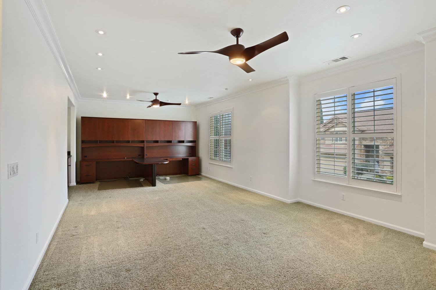 4305 Lourmarin Lane Modesto, CA 95356 - Photo 28 of 58 a big room with closet and windows
