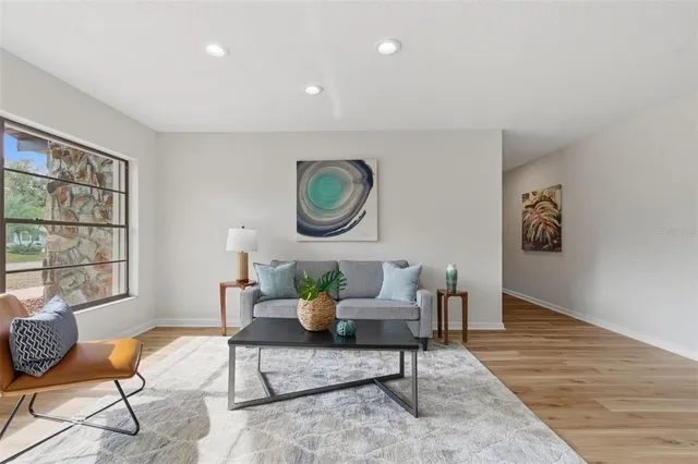 a workspace with furniture window and wooden floor