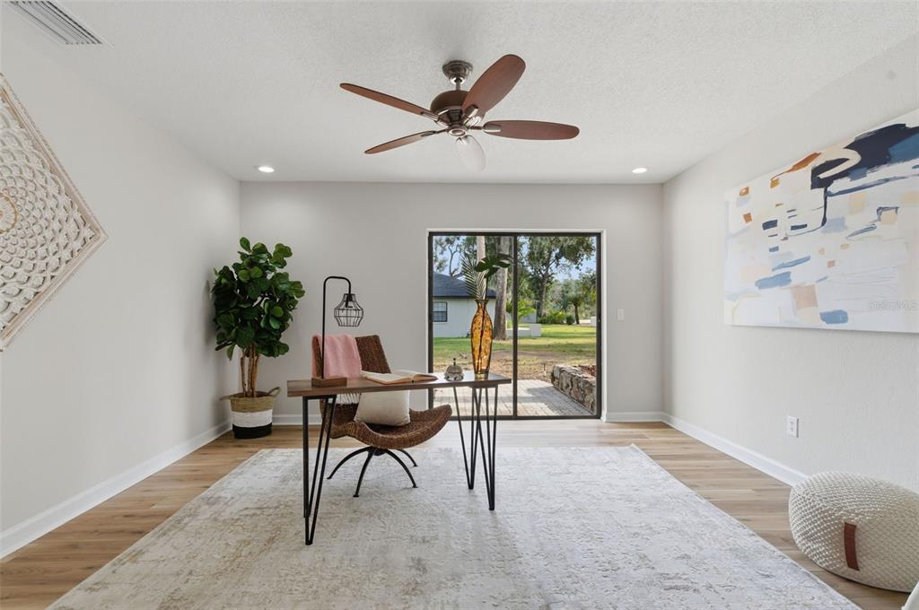 916 River Rapids Avenue Brandon, FL 33511 - Photo 15 of 61 a workspace with furniture and a window