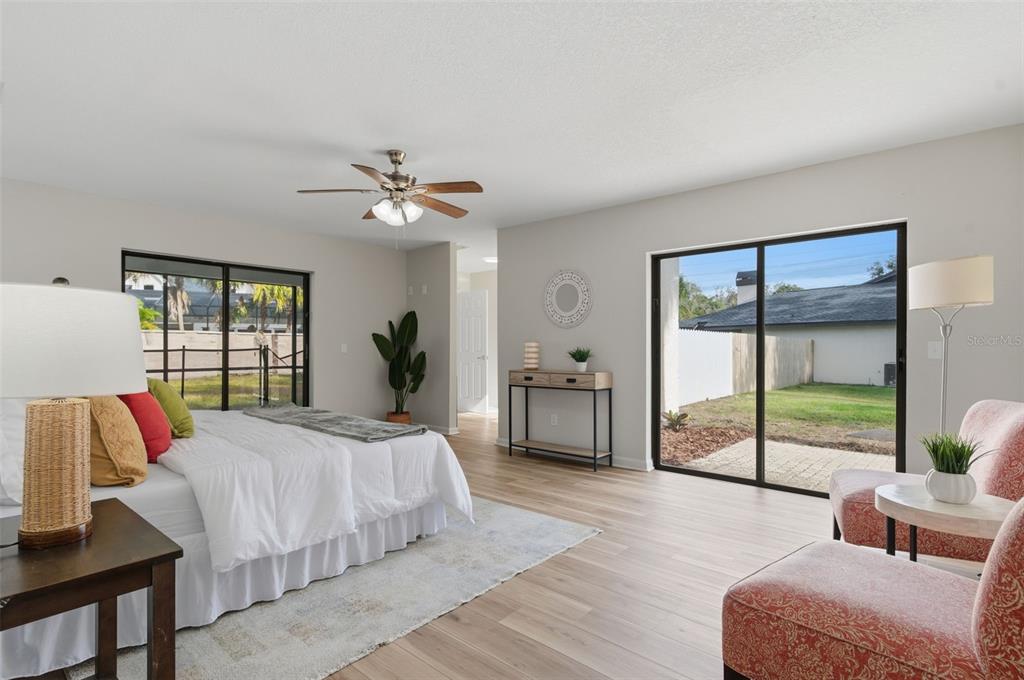 916 River Rapids Avenue Brandon, FL 33511 - Photo 27 of 61 a bedroom with a bed and a large window