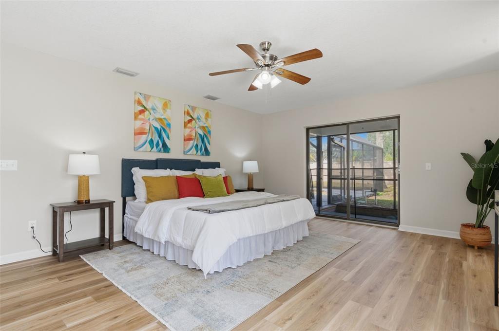 916 River Rapids Avenue Brandon, FL 33511 - Photo 29 of 61 a bedroom with a large bed and a window