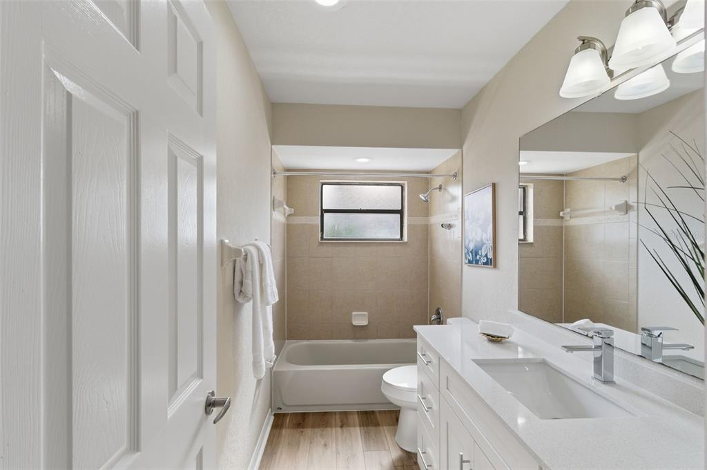 916 River Rapids Avenue Brandon, FL 33511 - Photo 41 of 61 a bathroom with a sink toilet and shower