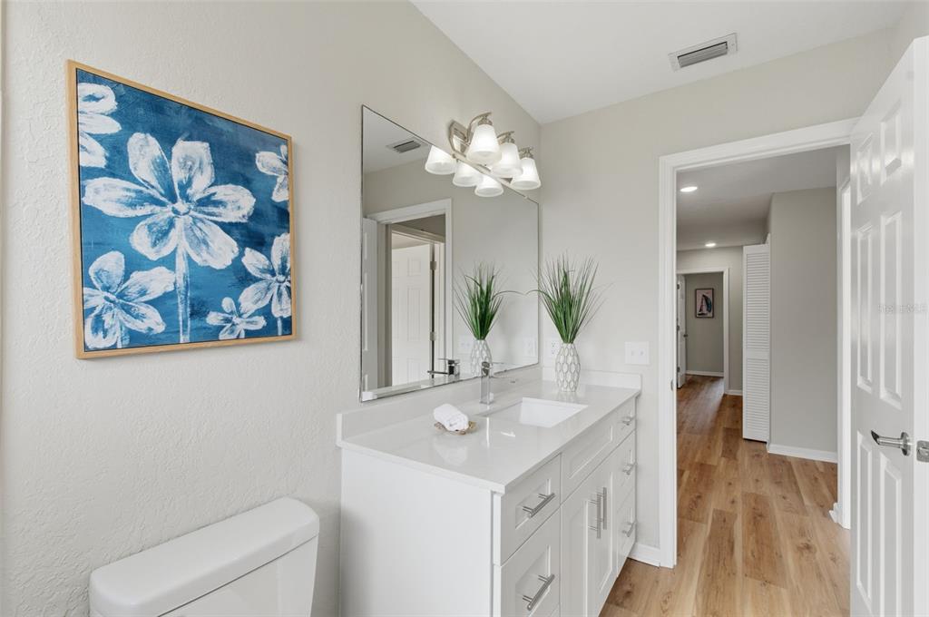 916 River Rapids Avenue Brandon, FL 33511 - Photo 42 of 61 a bathroom with a double vanity sink and a mirror