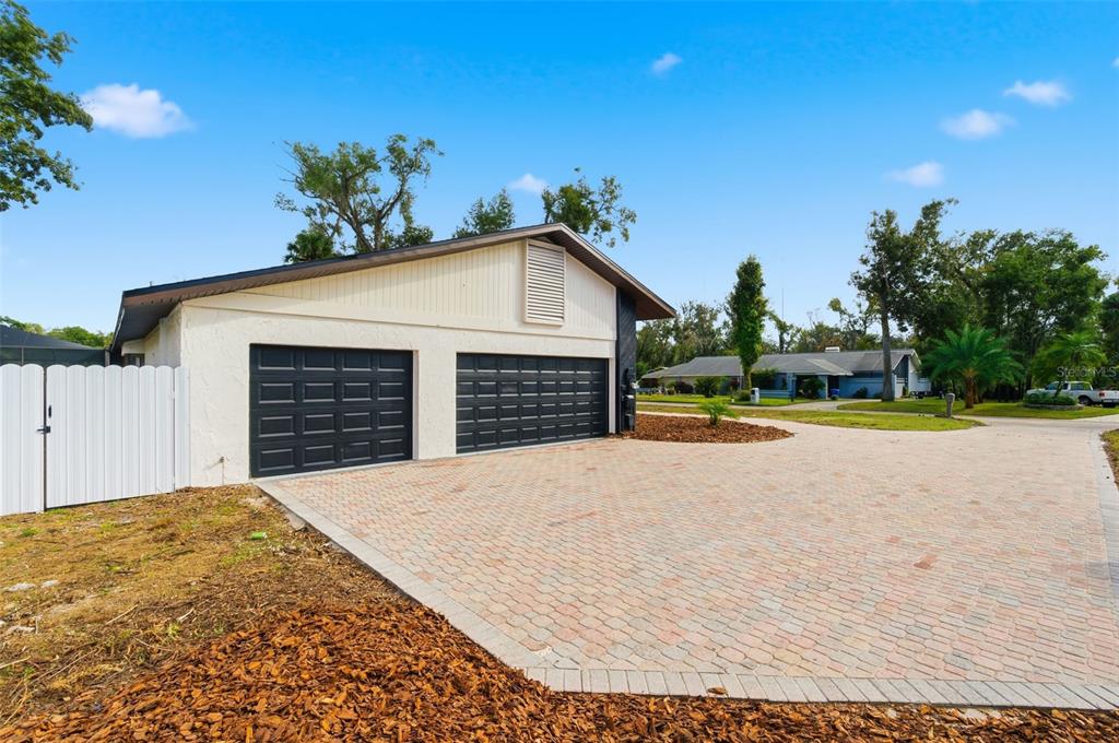 916 River Rapids Avenue Brandon, FL 33511 - Photo 5 of 61 a view of a house with a yard and potted plants