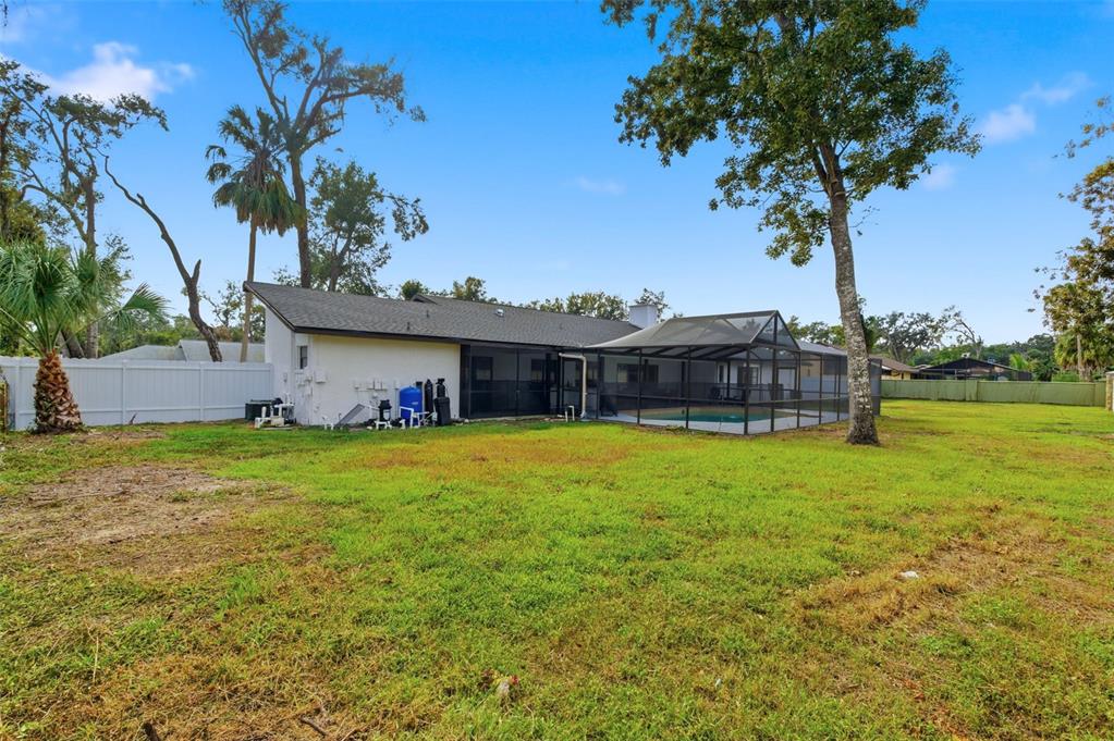 916 River Rapids Avenue Brandon, FL 33511 - Photo 58 of 61 a front view of a house with garden