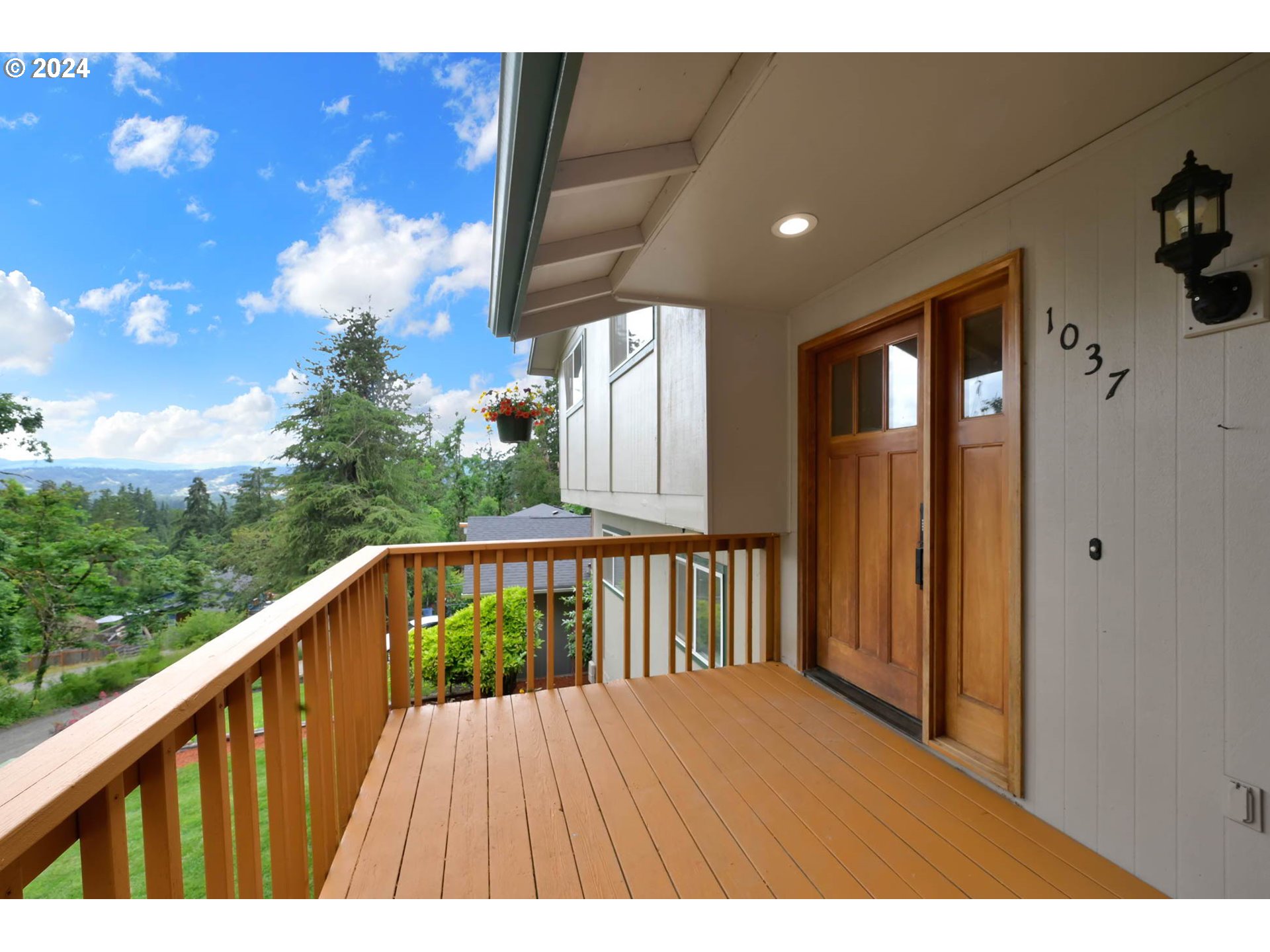 1037 South 70th Street Springfield, OR 97478 - Photo 38 of 44 a view of balcony with wooden floor