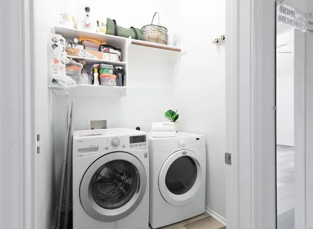 a utility room with dryer and washer