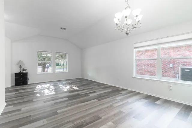 a view of a chandelier in a room