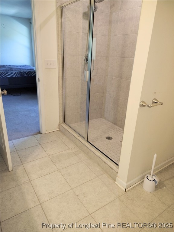 114 Sutherland Road Sanford, NC 27330 - Photo 7 of 16 a bathroom with a tub and a shower