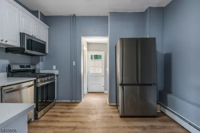 an empty room with wooden door