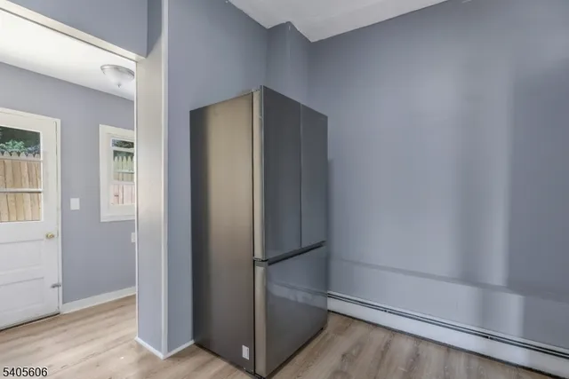 a bathroom with a sink and a window