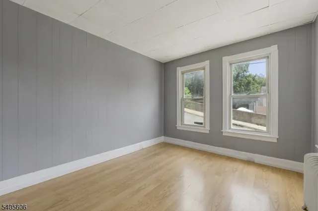 a kitchen with stainless steel appliances a refrigerator sink and cabinets
