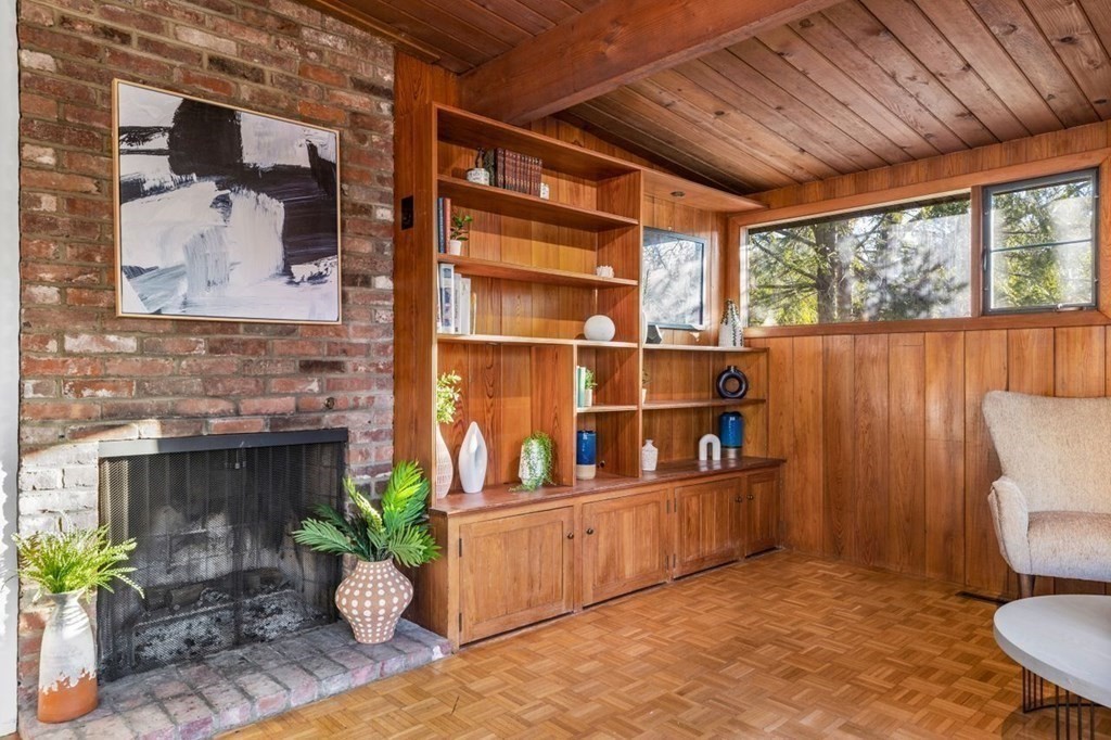 175 Bay Road Sharon, MA 02067 - Photo 4 of 19 a room with furniture and a fireplace