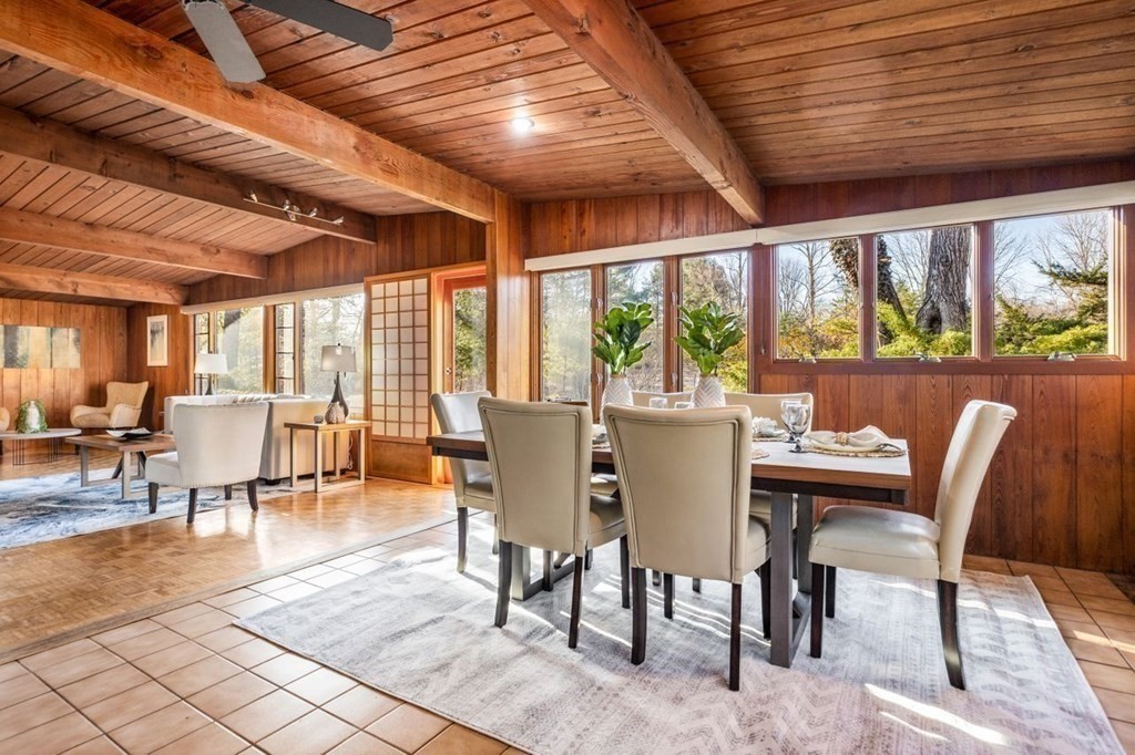 175 Bay Road Sharon, MA 02067 - Photo 7 of 19 a dining room with furniture a rug and a large window