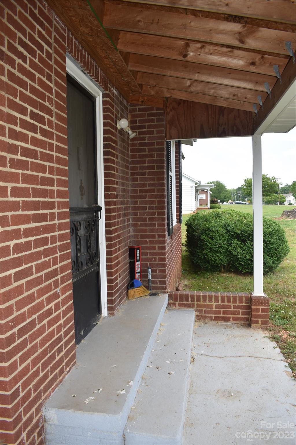 185 Stony Point School Road Stony Point, NC 28678 - Photo 19 of 21 a view of entrance door of the house