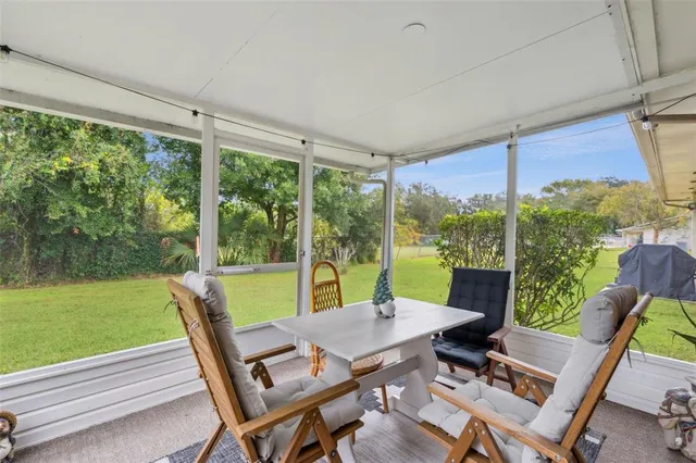 a front view of house with yard and trees