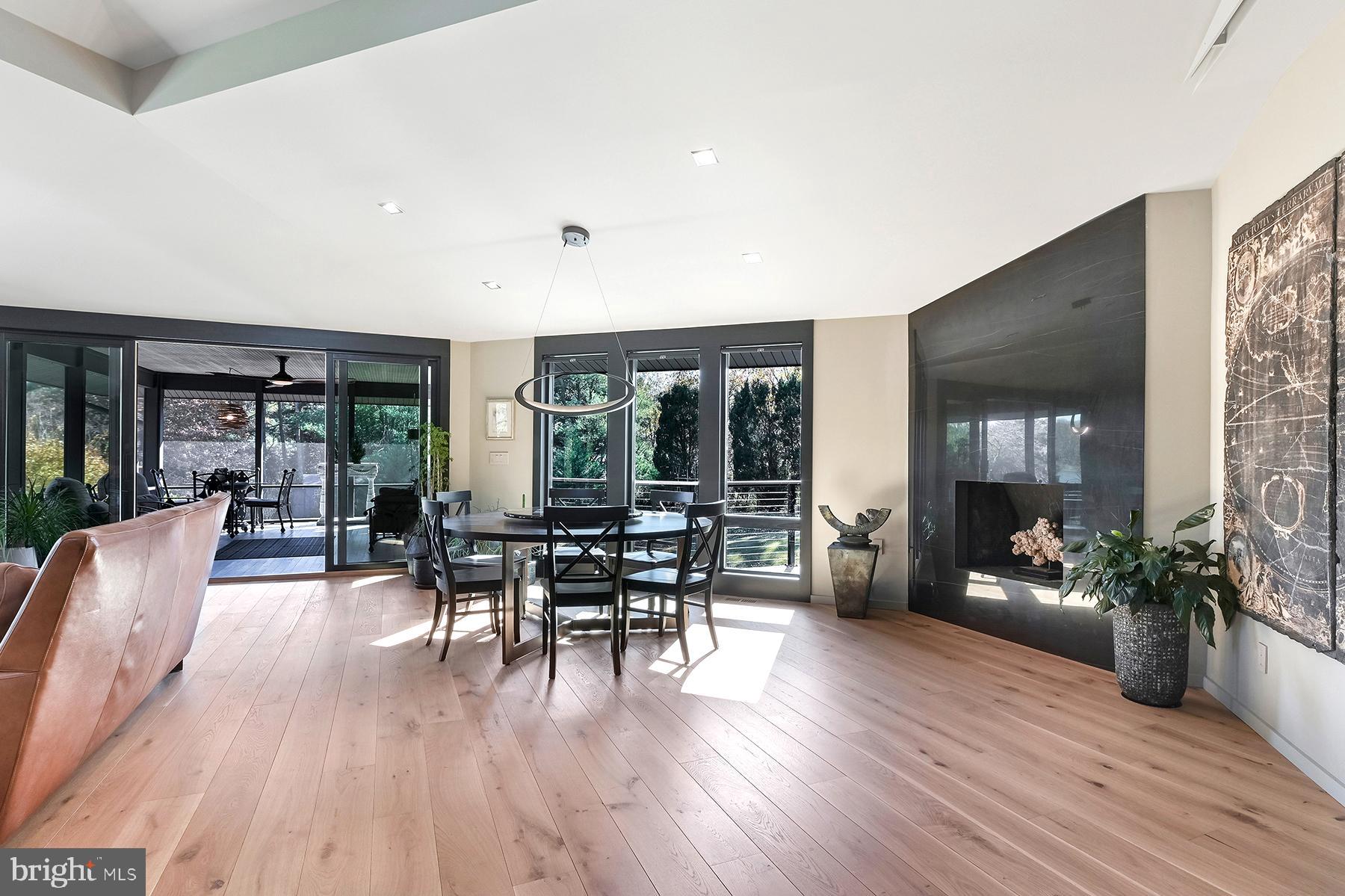 3333 Harness Creek Road Annapolis, MD 21403 - Photo 16 of 75 Raised hearth gas fireplace w/ Porcelanosa stone