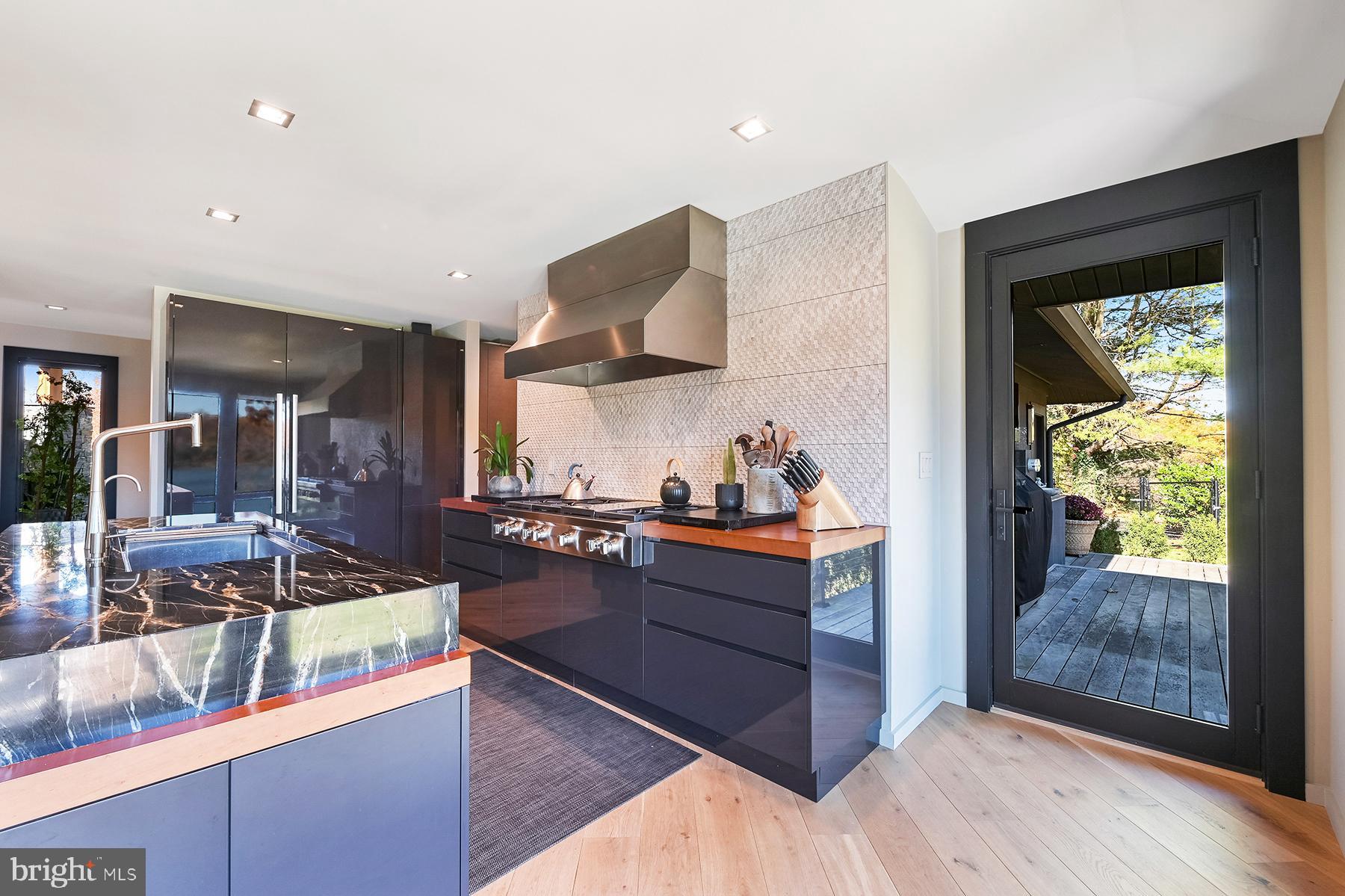 3333 Harness Creek Road Annapolis, MD 21403 - Photo 23 of 75 Wolf 6-burner gas cooktop with grill